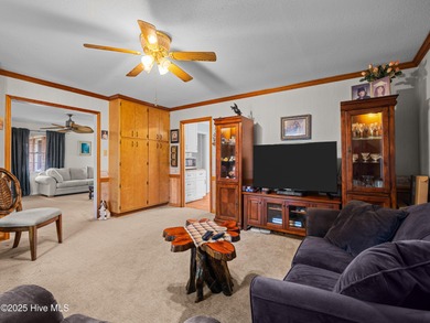 Welcome to 6101 Albatross Drive, located in the beautiful gated