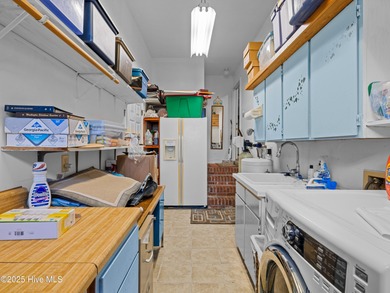 Welcome to 6101 Albatross Drive, located in the beautiful gated