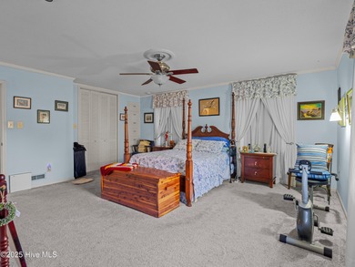 Welcome to 6101 Albatross Drive, located in the beautiful gated