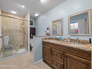 Welcome to 6101 Albatross Drive, located in the beautiful gated