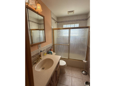 Welcome to 1612 N Gardiner Dr in Bay Shore! This charming - photo 8