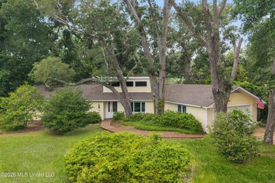 Nestled beneath a canopy of majestic live oaks on a large - photo 1