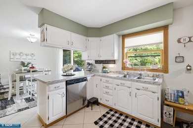 Welcome home to this beautifully maintained 4-bedroom, 2-bath - photo 3