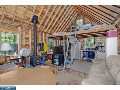Escape to the Northwoods with this off grid seasonal cabin on 7 - photo 4
