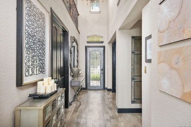 Exquisite two-story home within the exclusive guarded community - photo 7