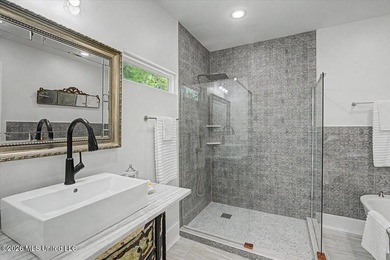 This beautifully renovated home combines modern luxury with - photo 12