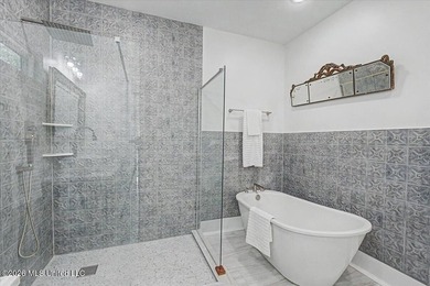 This beautifully renovated home combines modern luxury with - photo 13