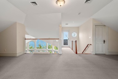 A captivating estate set atop a bluff with panoramic views of - photo 35