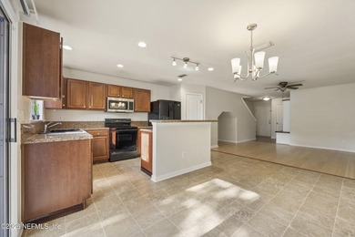 Located in the well-maintained Tuscany Village community, this - photo 3