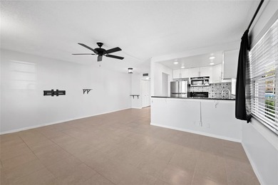 Spacious 1-bedroom, 1.5-bathroom condo conveniently located on - photo 3