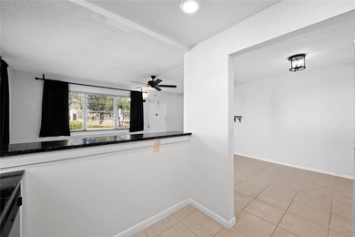 Spacious 1-bedroom, 1.5-bathroom condo conveniently located on - photo 4