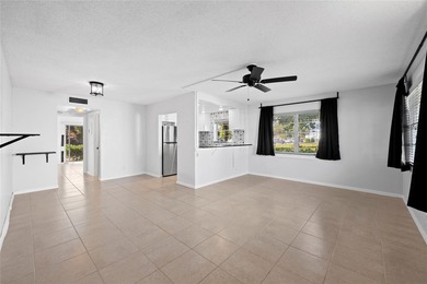 Spacious 1-bedroom, 1.5-bathroom condo conveniently located on - photo 10