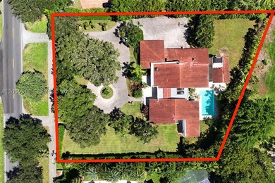 Located on a gracious 39,493 square foot lot in the prestigious - photo 1