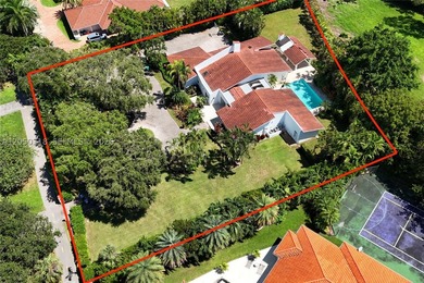 Located on a gracious 39,493 square foot lot in the prestigious - photo 2
