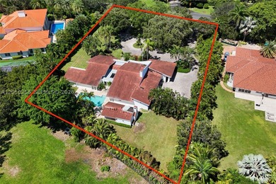 Located on a gracious 39,493 square foot lot in the prestigious - photo 3