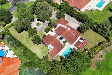 Located on a gracious 39,493 square foot lot in the prestigious - photo 5