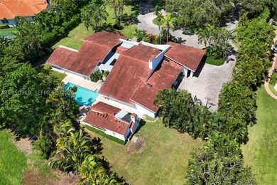 Located on a gracious 39,493 square foot lot in the prestigious - photo 6
