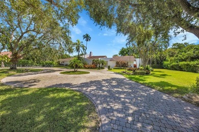 Located on a gracious 39,493 square foot lot in the prestigious - photo 9