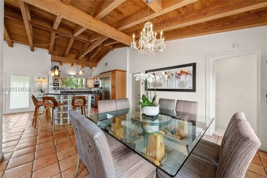 Located on prestigious South Hibiscus Drive, this exceptional - photo 11