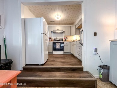 Coastal charm meets modern convenience in this beautifully - photo 11