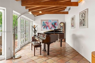 Located on prestigious South Hibiscus Drive, this exceptional - photo 12