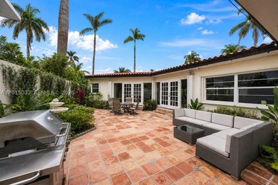 Located on prestigious South Hibiscus Drive, this exceptional - photo 13
