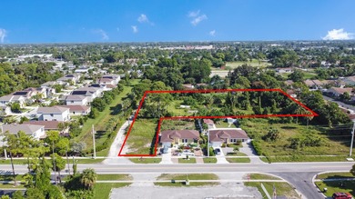 This prime 1.41-acre property in central Lake Worth offers two - photo 3