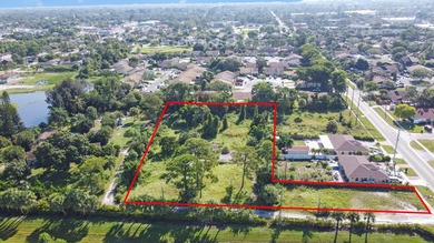 This prime 1.41-acre property in central Lake Worth offers two - photo 5