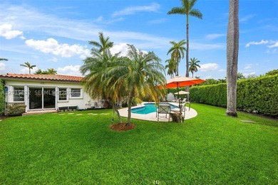 Located on prestigious South Hibiscus Drive, this exceptional - photo 17