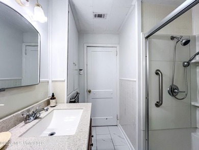 Coastal charm meets modern convenience in this beautifully - photo 19