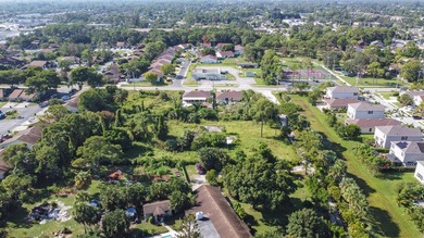 This prime 1.41-acre property in central Lake Worth offers two - photo 9
