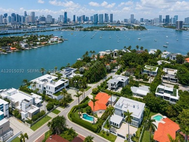 Located on prestigious South Hibiscus Drive, this exceptional - photo 27