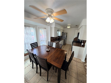 Step into this inviting 4 bedroom, 2 bath home tucked away on a - photo 13