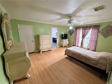 Step into this inviting 4 bedroom, 2 bath home tucked away on a - photo 15