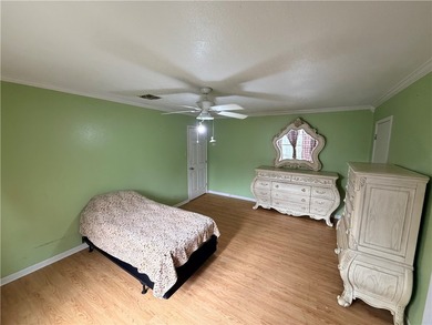 Step into this inviting 4 bedroom, 2 bath home tucked away on a - photo 16