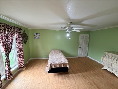 Step into this inviting 4 bedroom, 2 bath home tucked away on a - photo 17