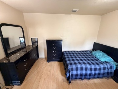 Step into this inviting 4 bedroom, 2 bath home tucked away on a - photo 22
