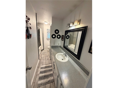 Step into this inviting 4 bedroom, 2 bath home tucked away on a - photo 23