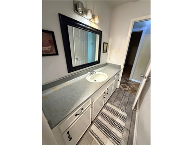 Step into this inviting 4 bedroom, 2 bath home tucked away on a - photo 24