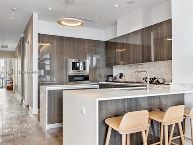 Enter a refined Upper Penthouse Residence with sweeping