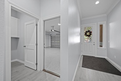 Beautiful new 3/2/2 home in secluded St. Andrews Place, nestled - photo 4