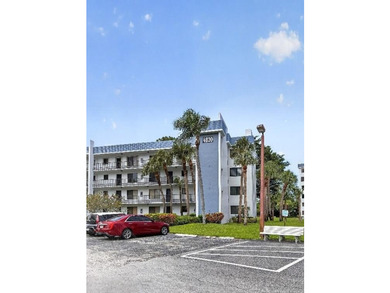 EXCITING opportunity in Lucerne Lakes! This 4th-floor Lake Worth - photo 1