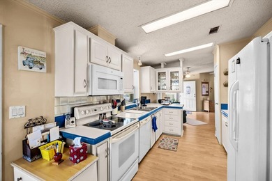 Enjoy lakeside living in this 3-bedroom, 2-bath home located in - photo 13