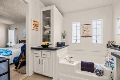 Enjoy lakeside living in this 3-bedroom, 2-bath home located in - photo 21