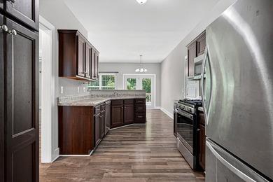 Welcome home! This beautifully maintained 2020-built gem sits on - photo 11