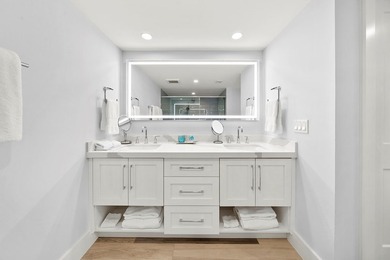 Stunning 4 Br/3 Ba Oceanfront lower-level unit. Designed - photo 12