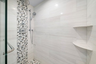 Stunning 4 Br/3 Ba Oceanfront lower-level unit. Designed - photo 17
