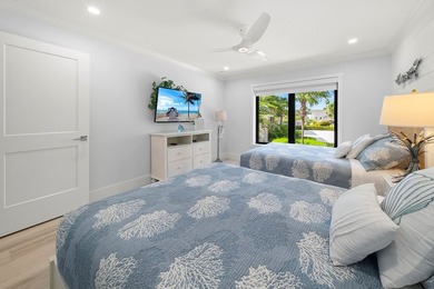 Stunning 4 Br/3 Ba Oceanfront lower-level unit. Designed - photo 23