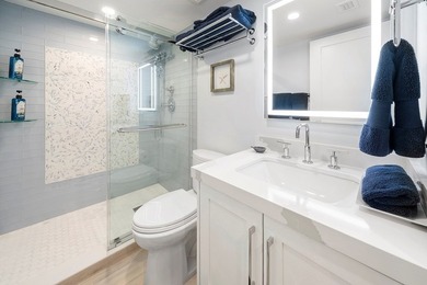 Stunning 4 Br/3 Ba Oceanfront lower-level unit. Designed - photo 25