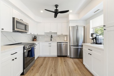 Welcome to this beautifully renovated 2-bedroom, 2-bath, 1060 sq - photo 9